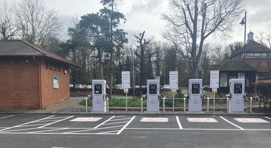 Rapid electric vehicle chargers in a car park